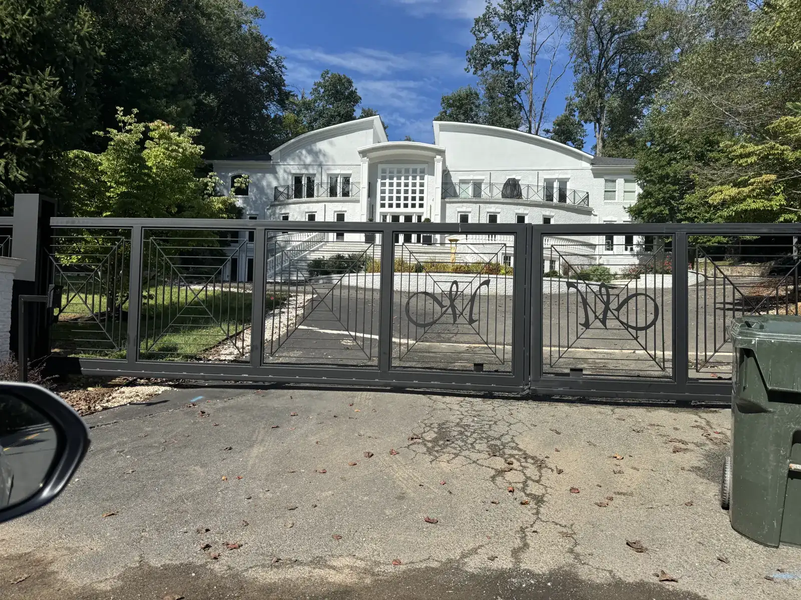 Dual swing driveway gate at a Northern Virginia home, under Our Fencing Projects