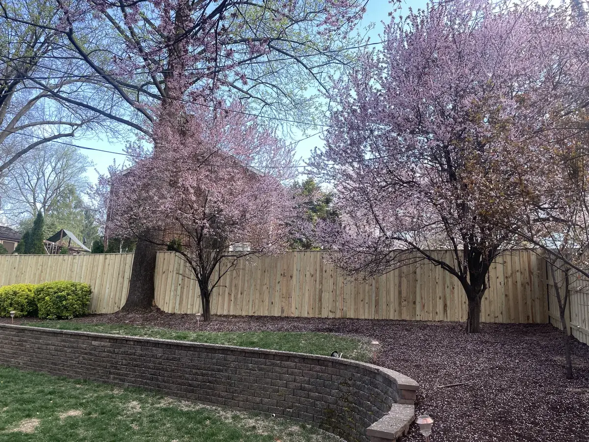 Board-on-board wood privacy fence line, under Our Fencing Projects