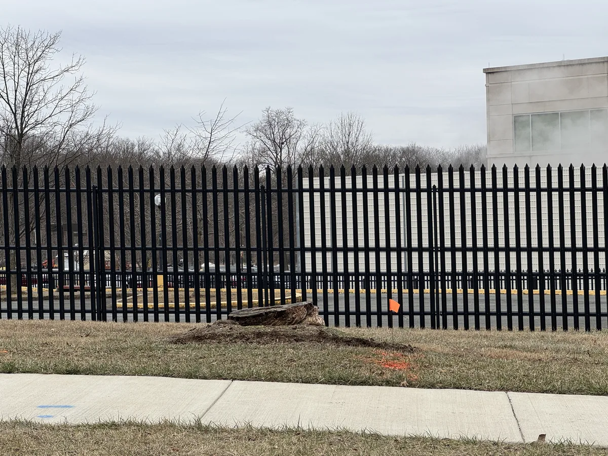 Commercial fence with a vehicle gate, under Our Fencing Projects