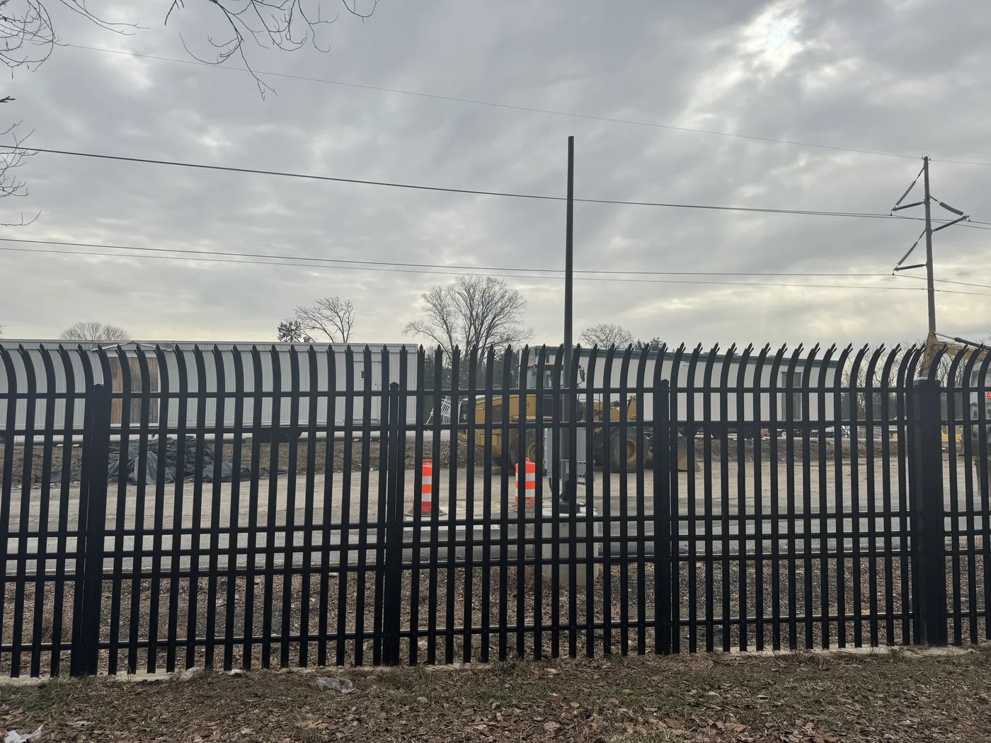 Commercial security fence line along a business frontage, under Our Fencing Projects