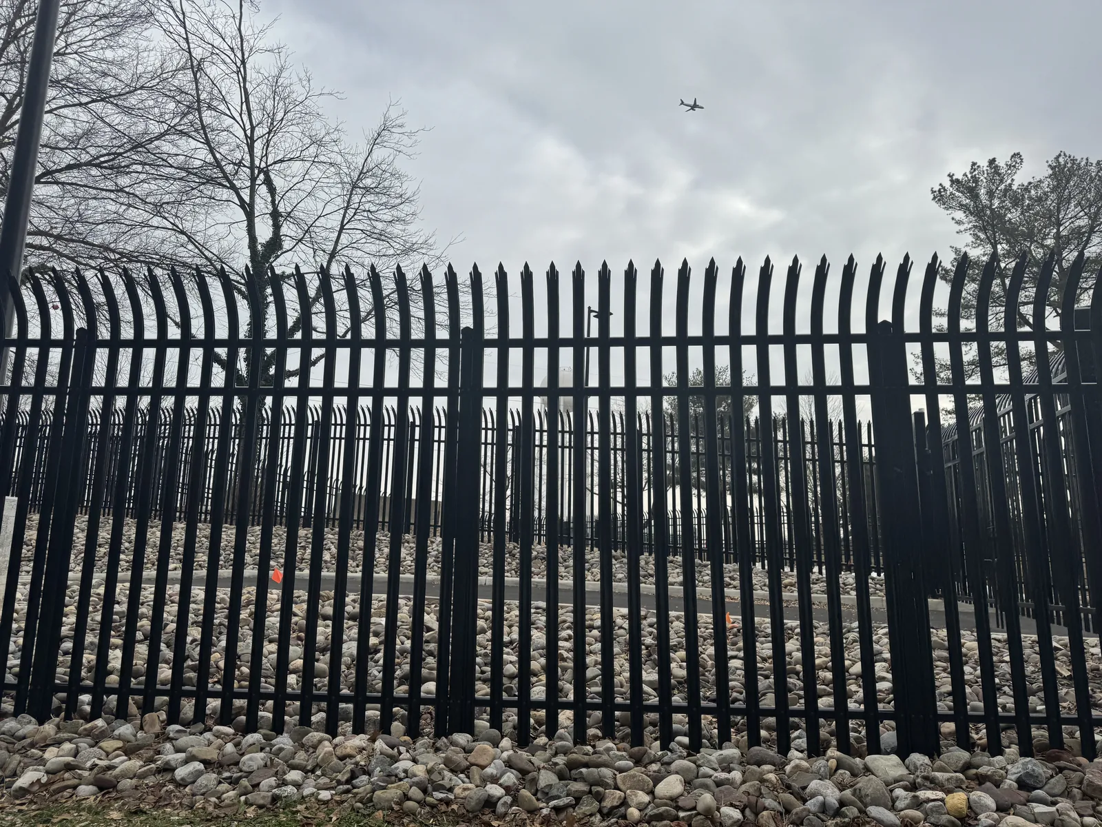 Black steel security fence with spear-top pickets at a commercial property, under Our Fencing Projects
