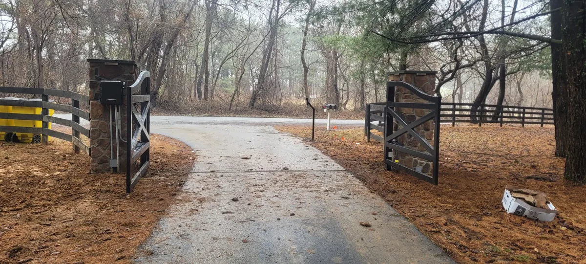 Aluminum farm gate at a property entry, under Our Fencing Projects