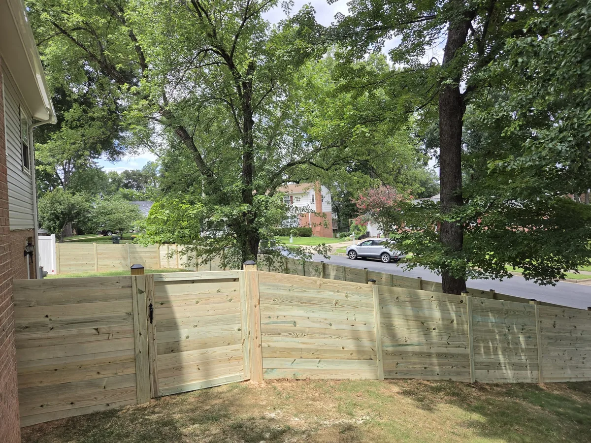 Old fences that stepped wrong get re-laid to the yard's actual grade., under Fence Replacement & Old Fence Removal