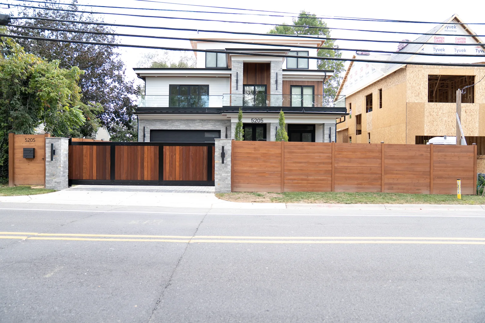 For short driveways and sloped entries where swing has no room., under Automatic Gate Installation & Repair