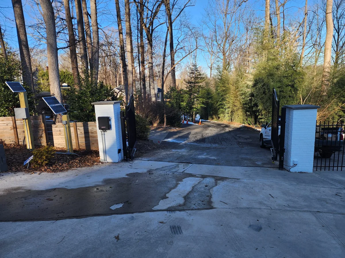 Solar panel and control box for an automatic gate in Northern Virginia, under Our Fencing Projects