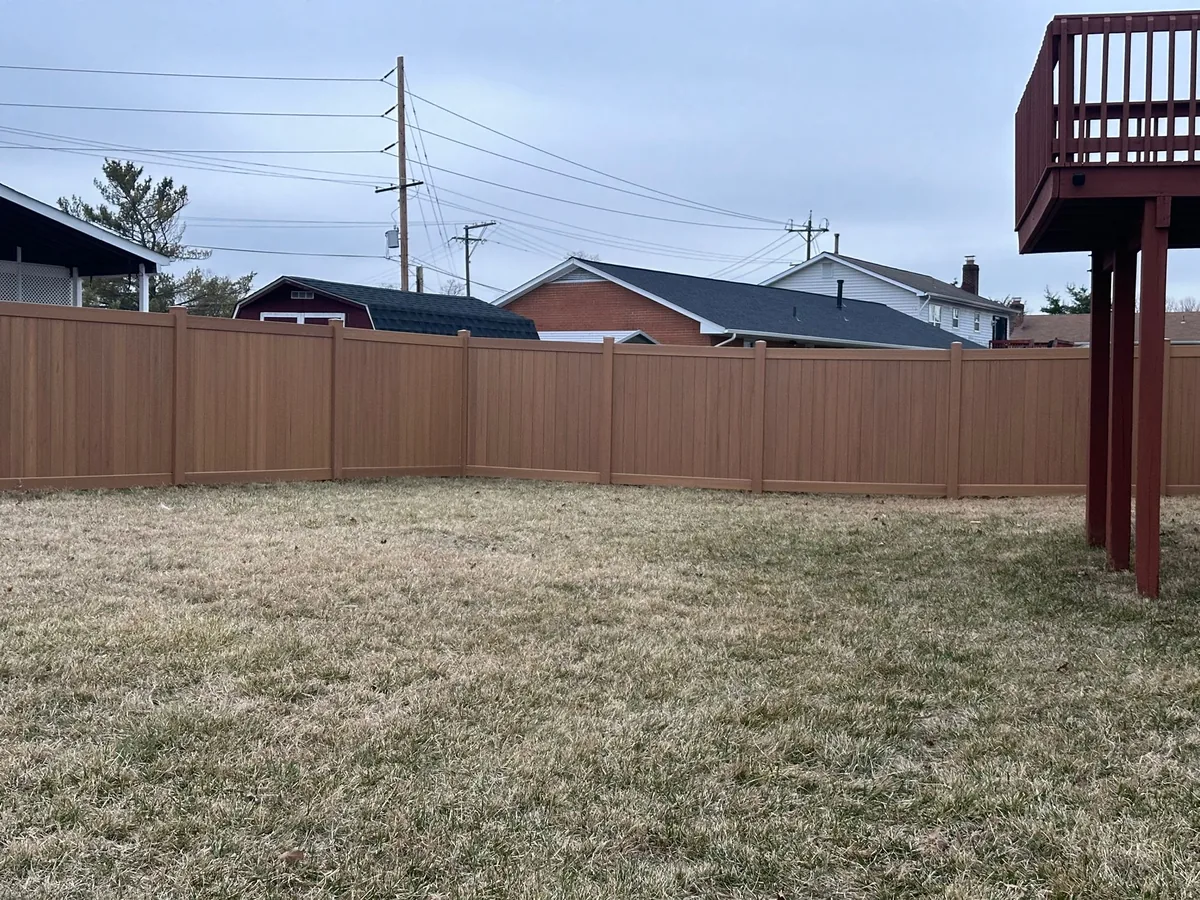 Cypress-toned vinyl privacy fence, under Our Fencing Projects