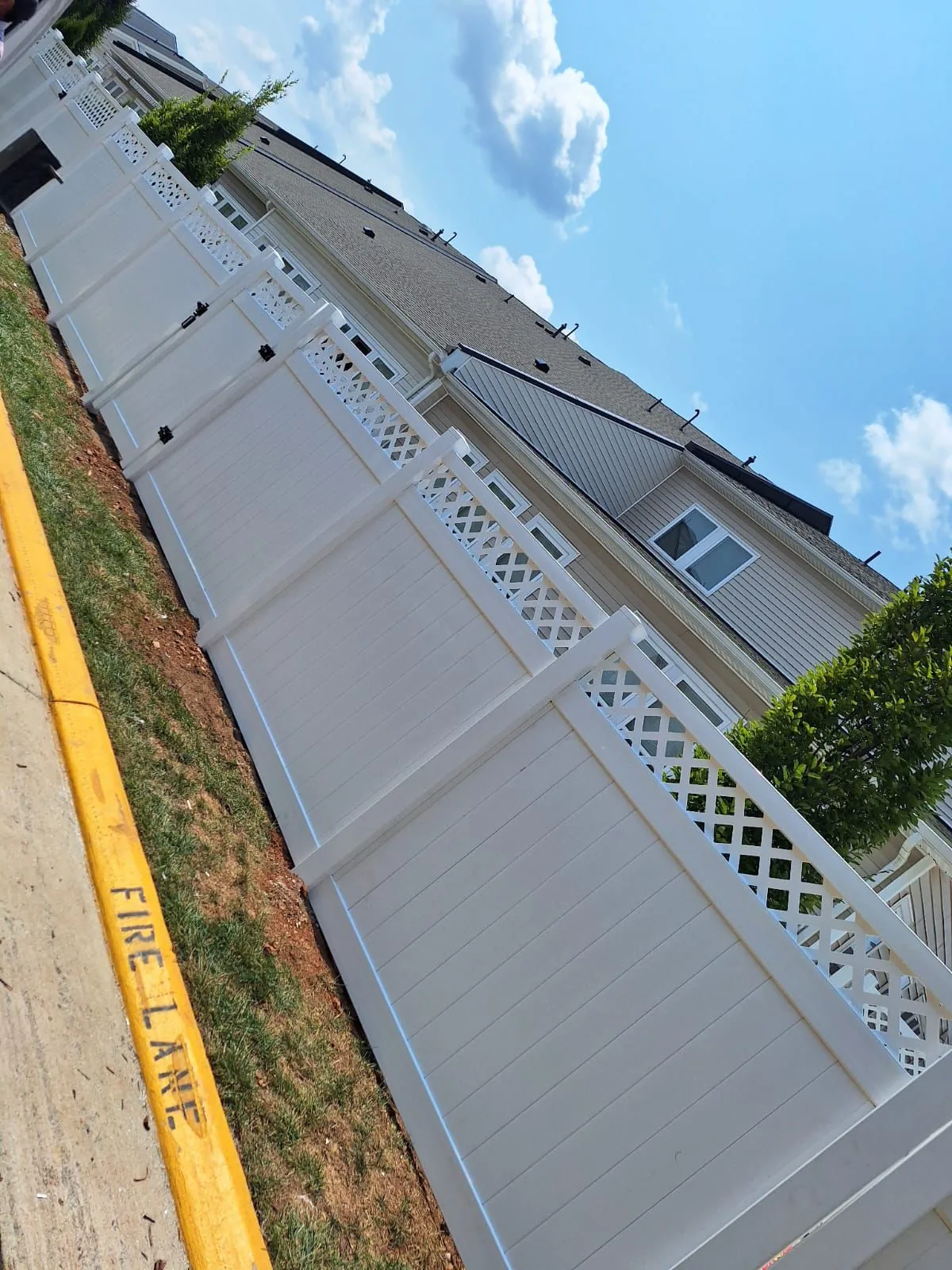 Vinyl privacy fence with lattice accent, under Our Fencing Projects