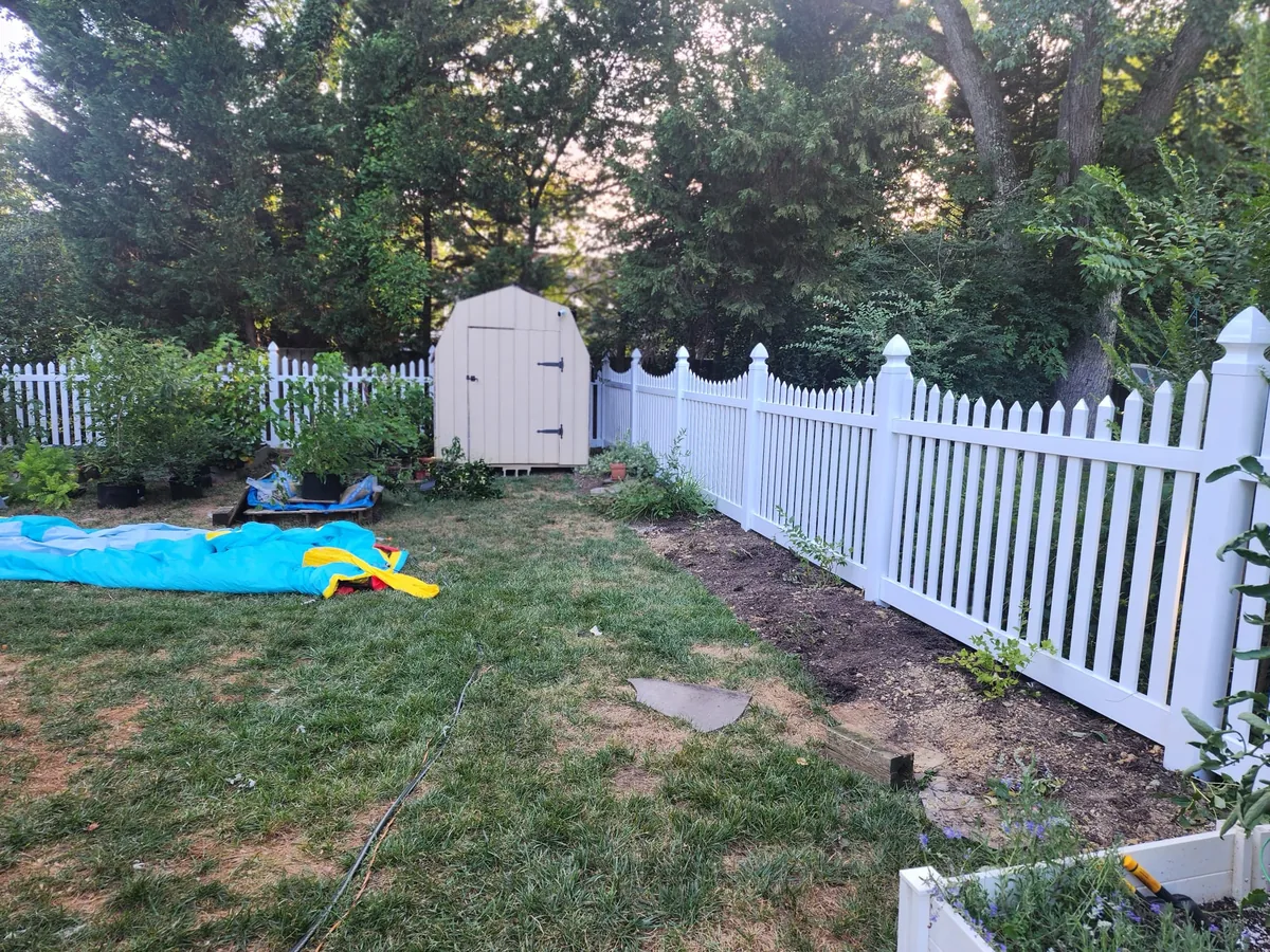 White vinyl scalloped spaced picket fence, under Our Fencing Projects