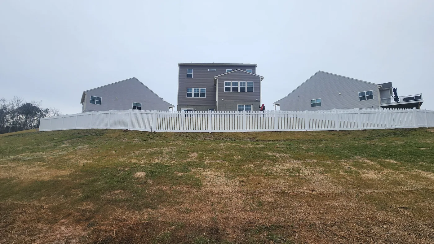 White vinyl straight-top picket fence, under Our Fencing Projects