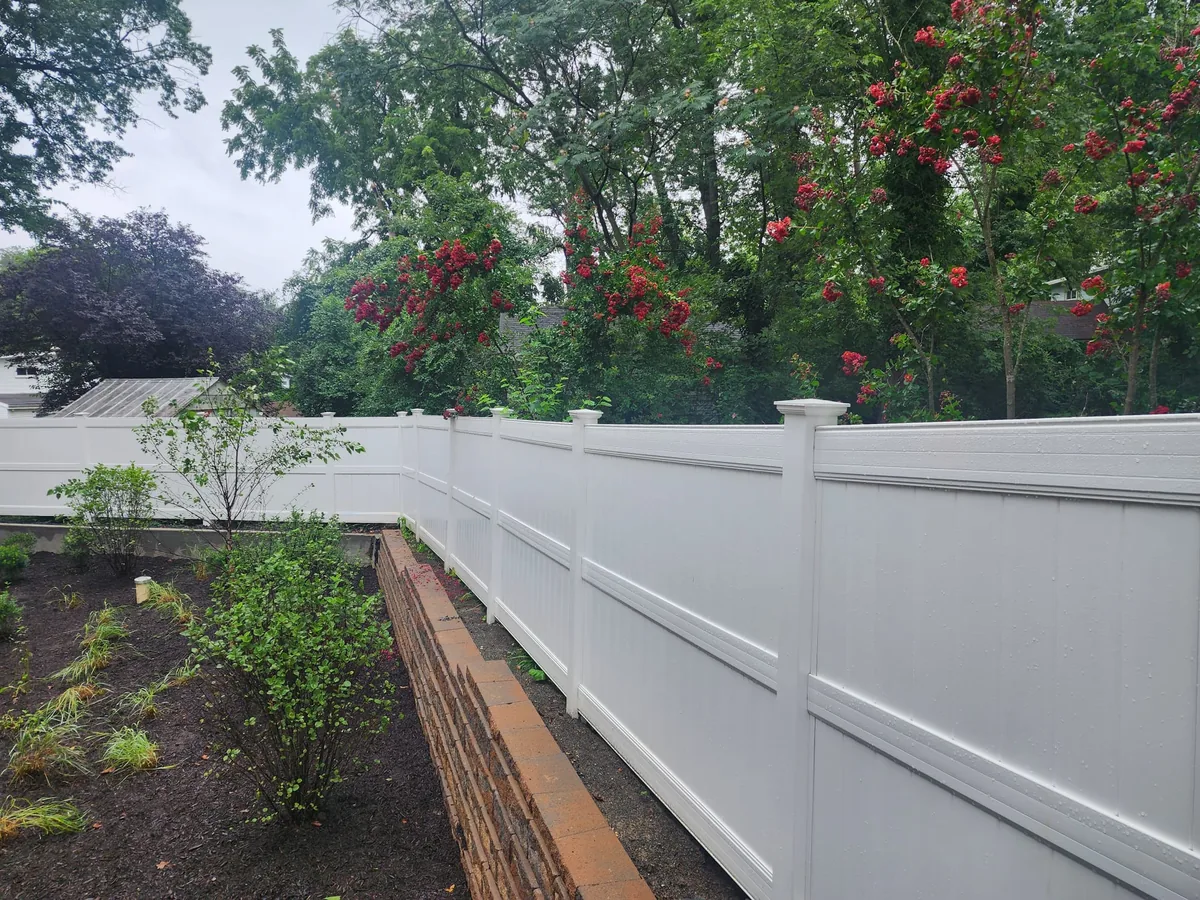 White vinyl three-rail ranch fence, under Our Fencing Projects