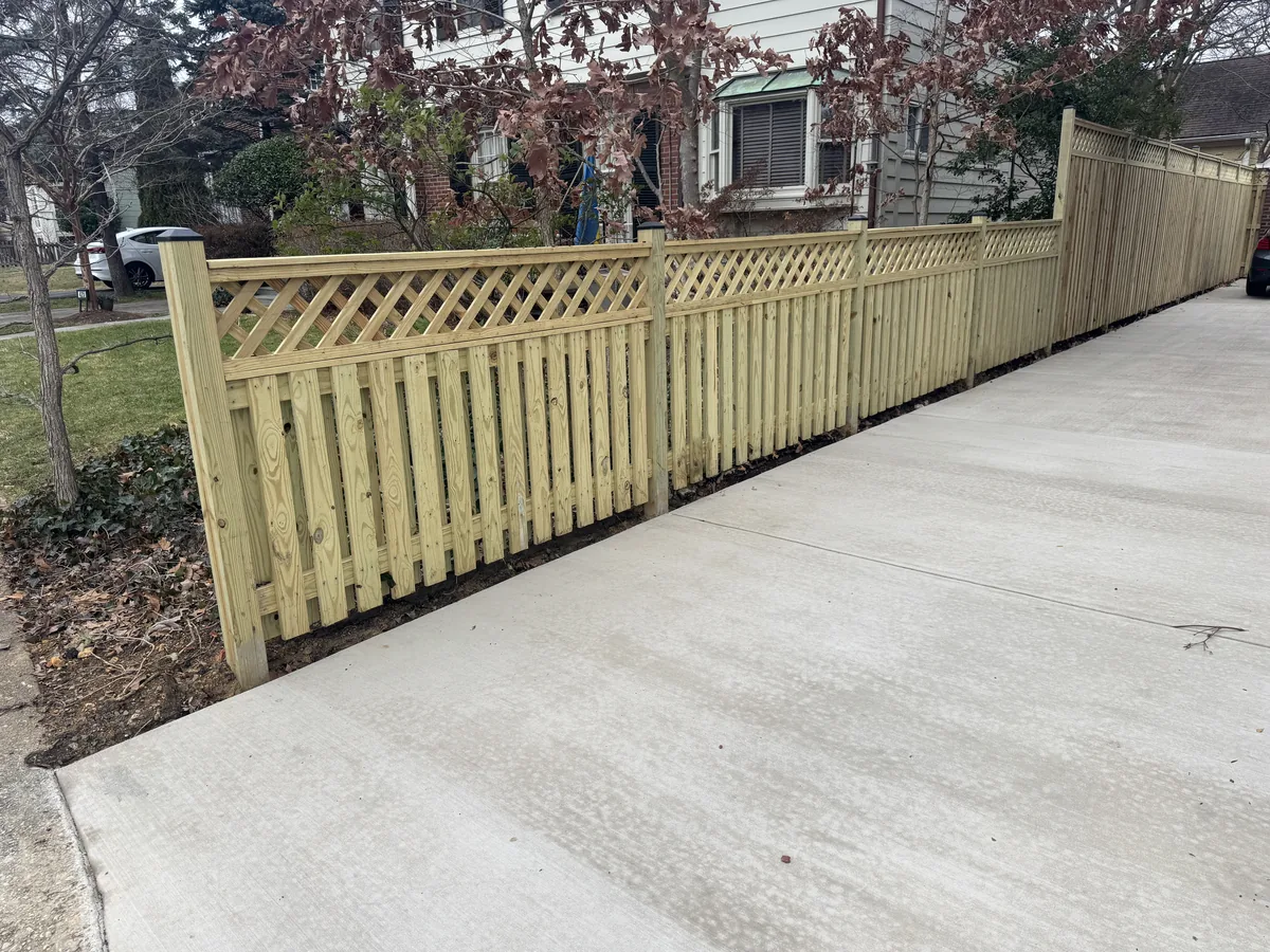 Wood privacy fence with a lattice top, under Our Fencing Projects