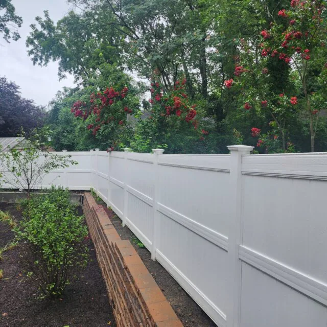 “Super Fabrications installed this elegant white vinyl privacy fence, combining durability, low maintenance, and modern style for a private backyard retreat.”